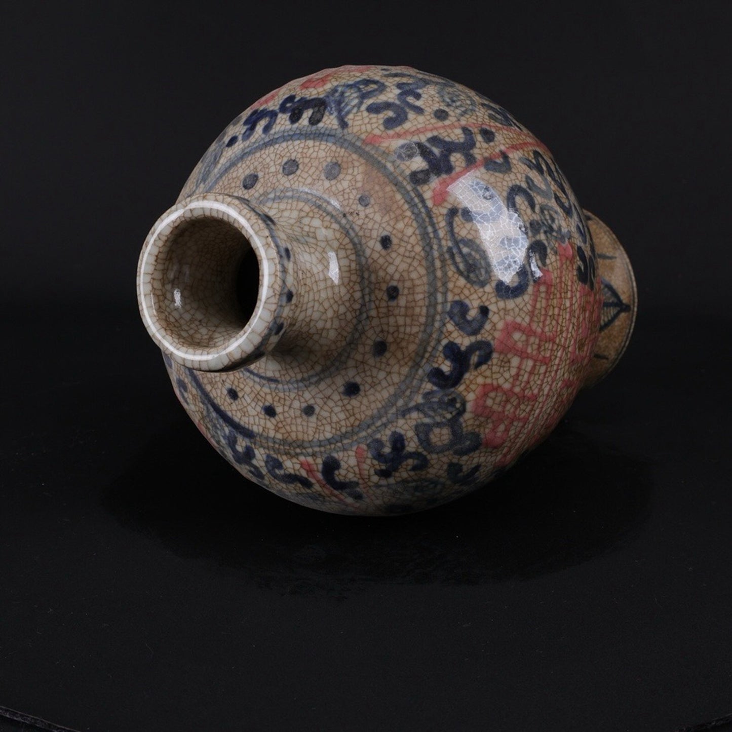 Blue and white glazed plum vase with red auspicious character pattern