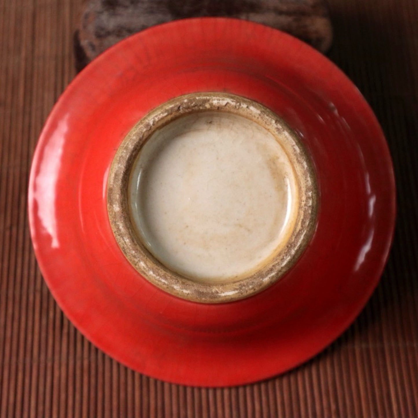 Small bowl with blue, white, and red glazed branches and lotus patterns