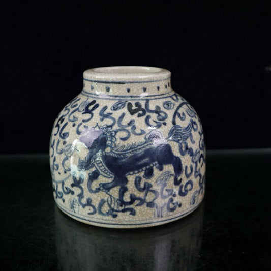 Open blue and white lion patterned jar