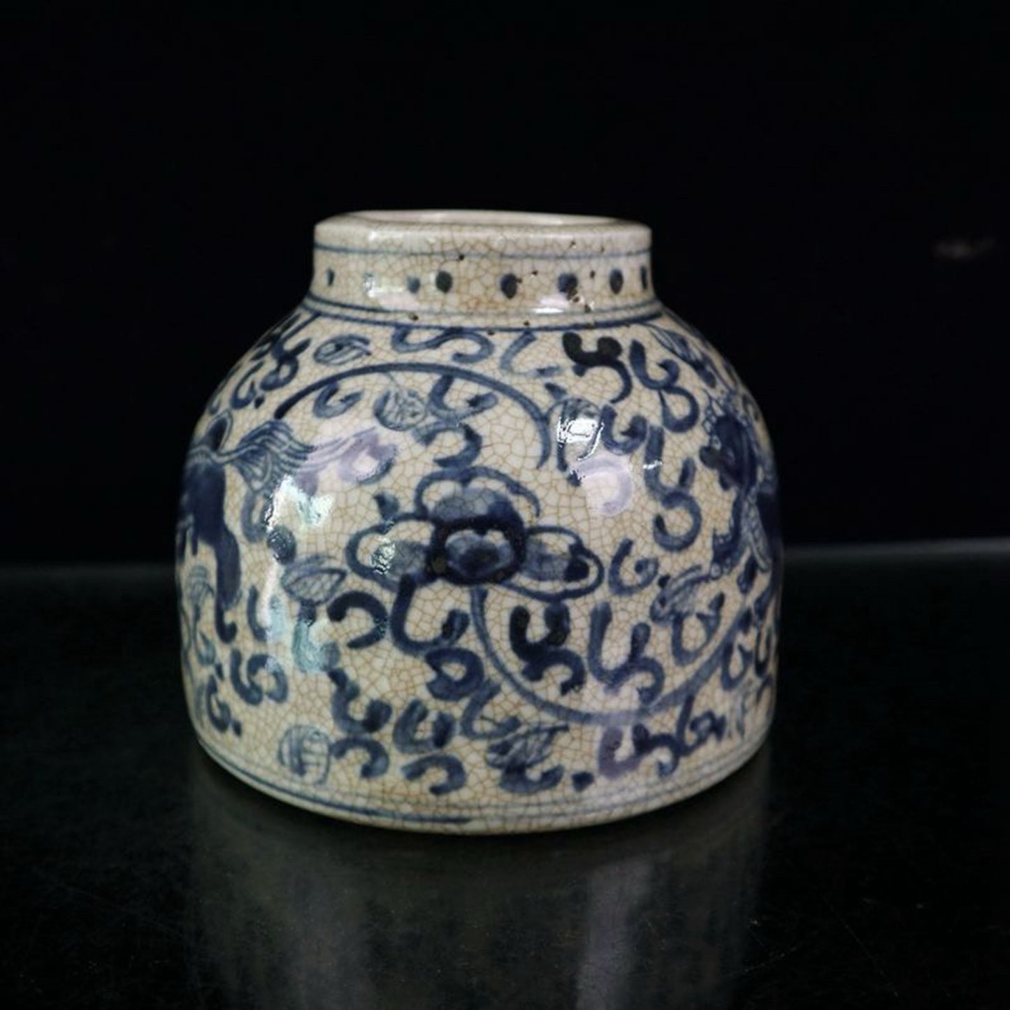 Open blue and white lion patterned jar