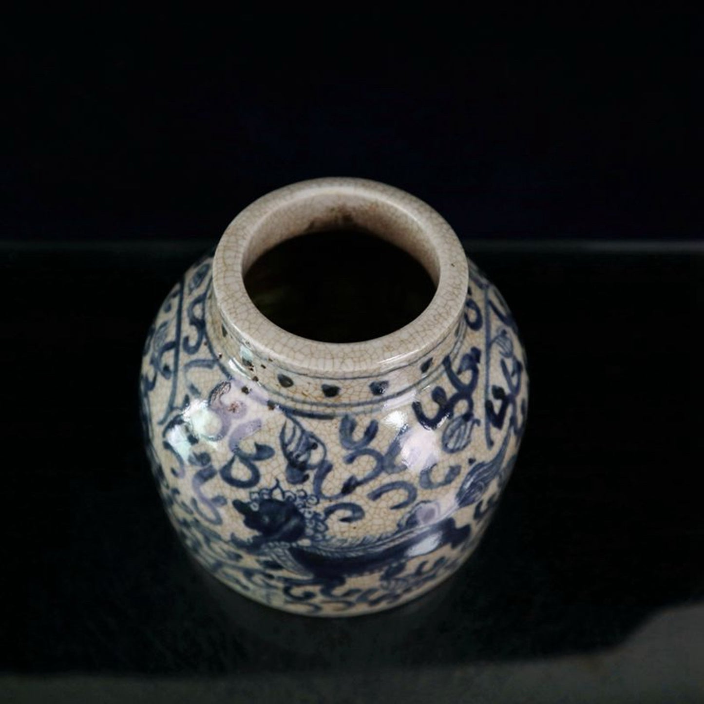 Open blue and white lion patterned jar