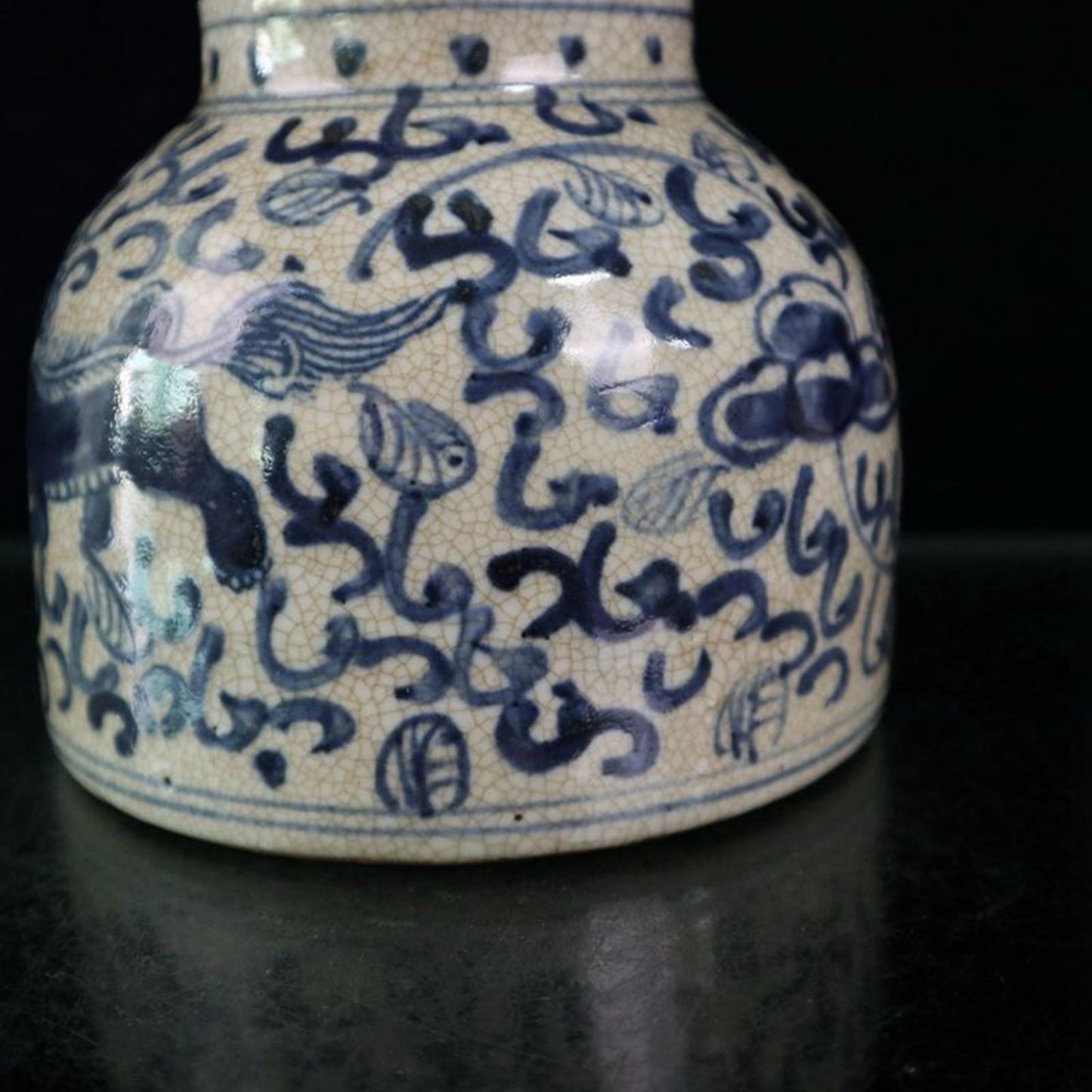 Open blue and white lion patterned jar