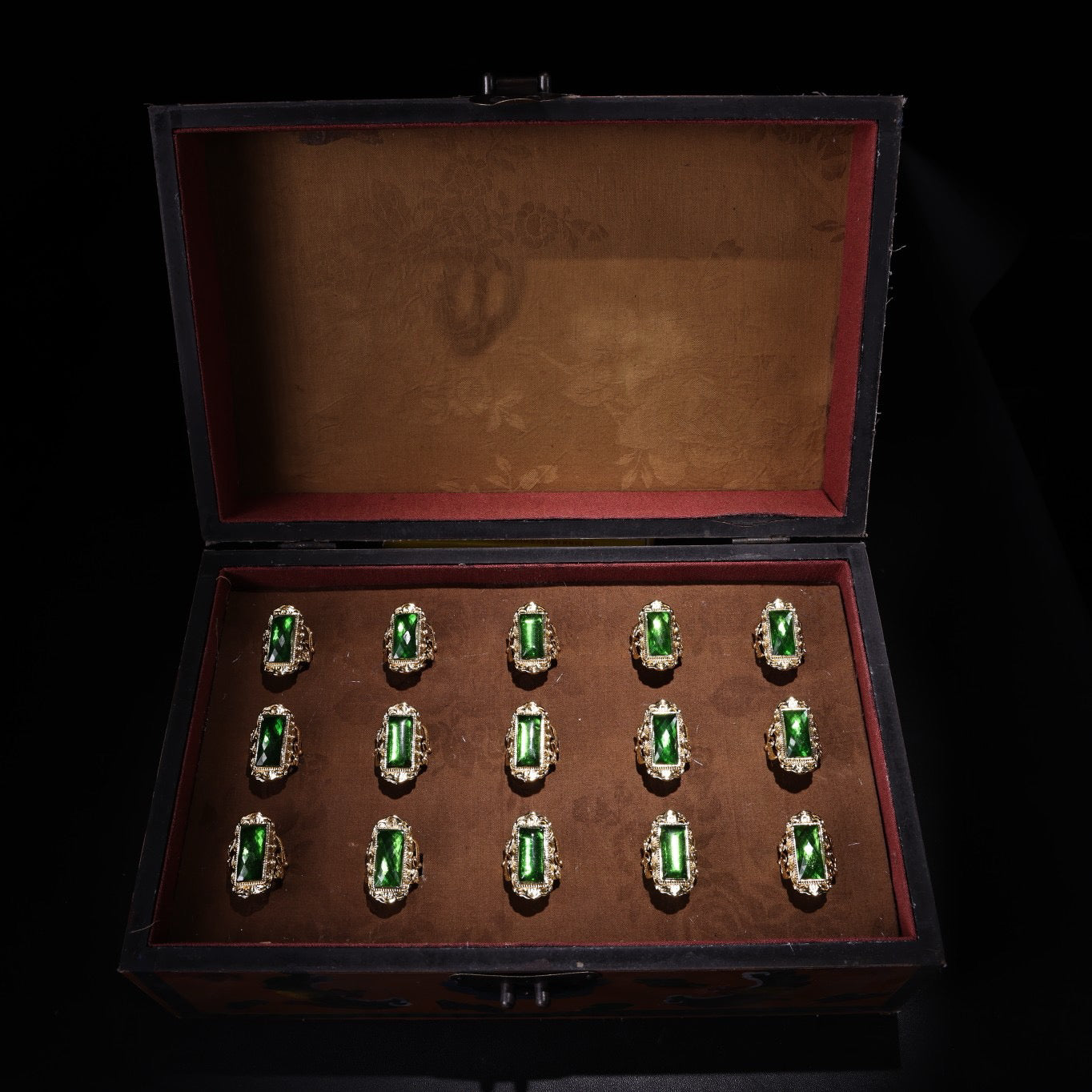 A box of Chinese antique cloisonne grandmother emerald rings