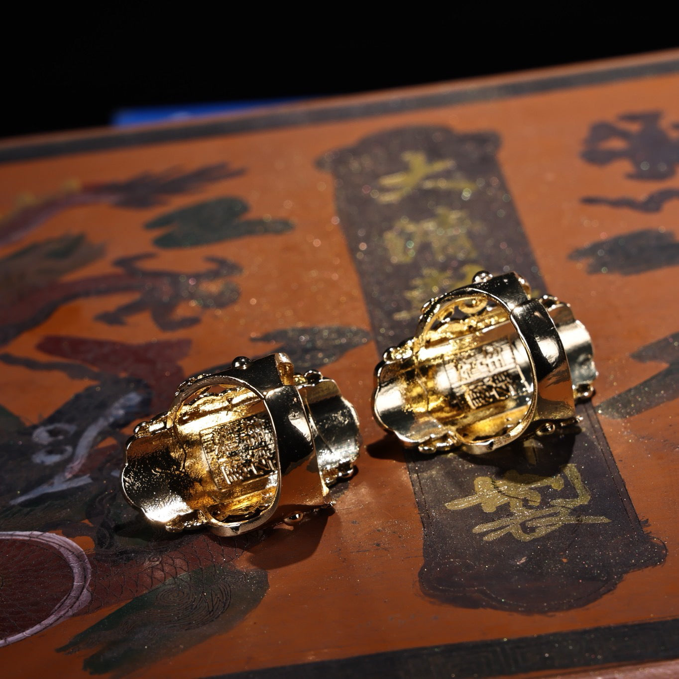 A box of Chinese antique cloisonne grandmother emerald rings