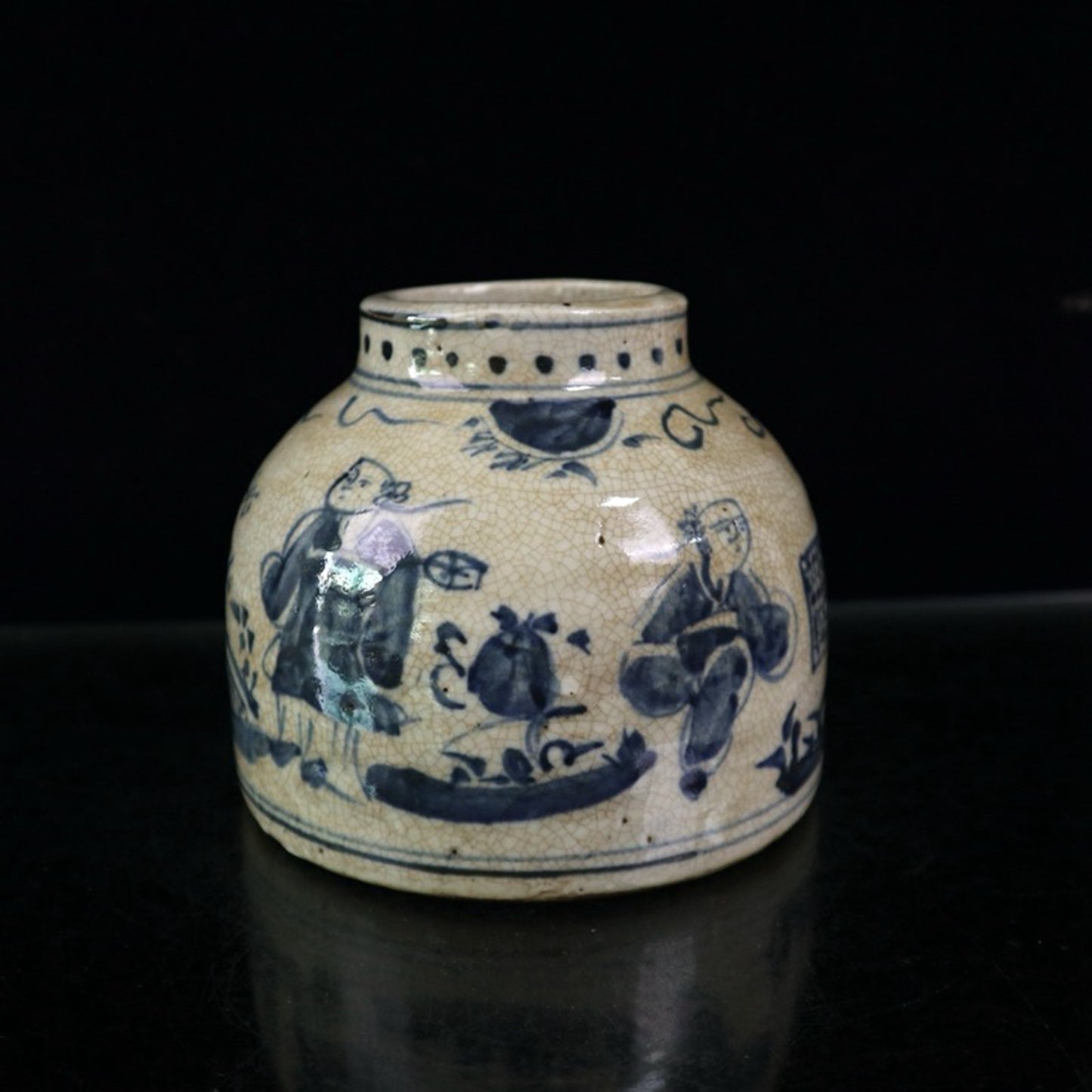 Open blue and white figure patterned jar