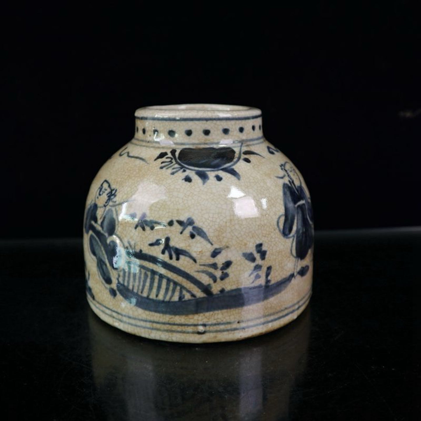 Open blue and white figure patterned jar