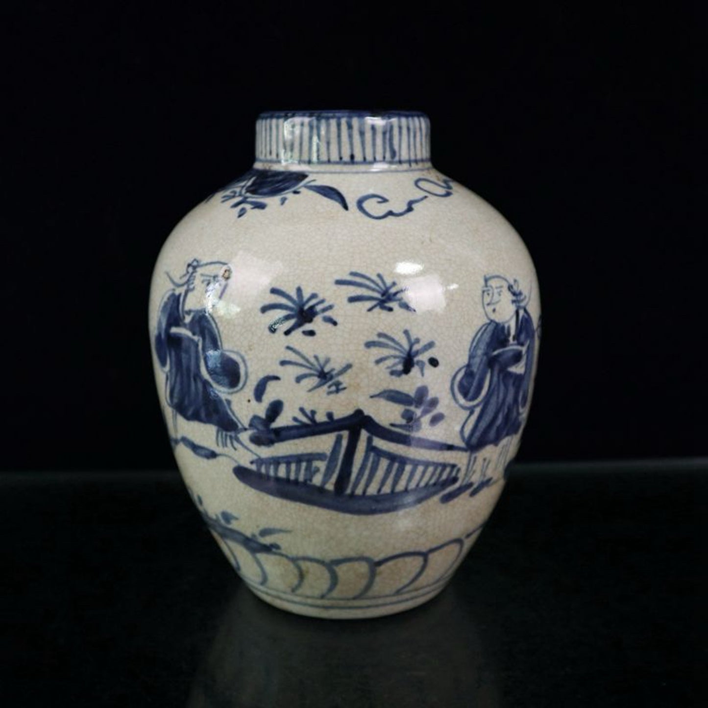 Open blue and white figure patterned jar