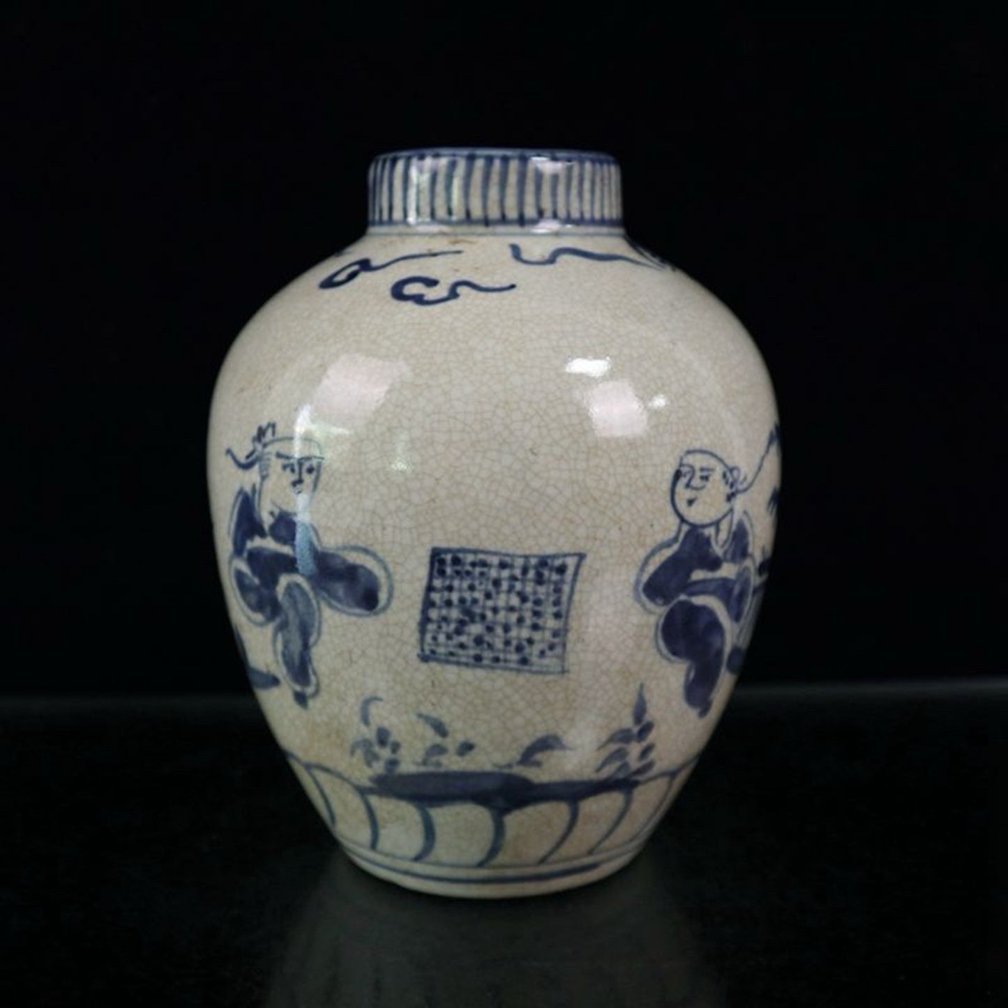 Open blue and white figure patterned jar