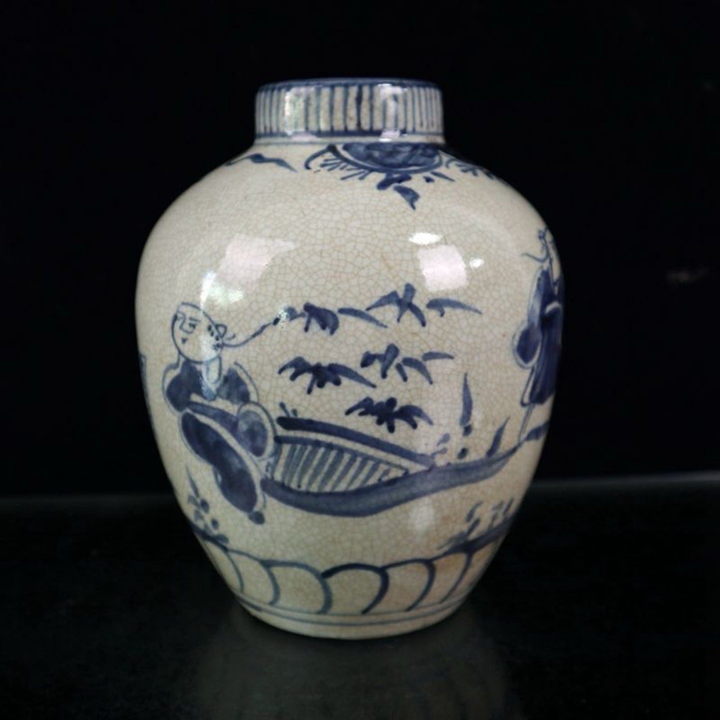 Open blue and white figure patterned jar