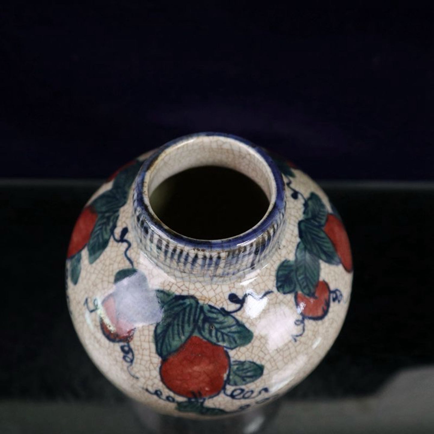Open blue and white with colorful melon and fruit patterns and jujube jar