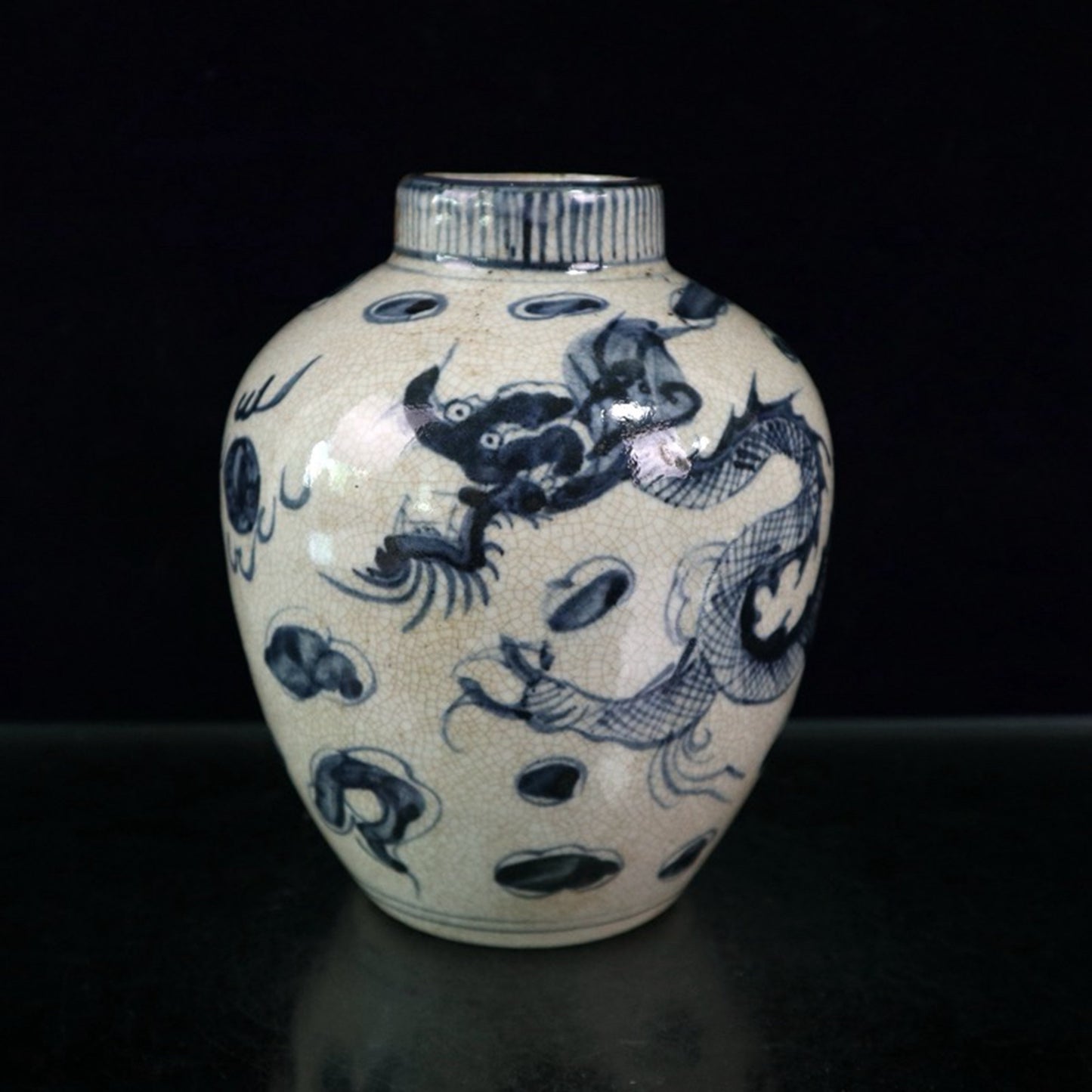 Open blue and white dragon patterned jar