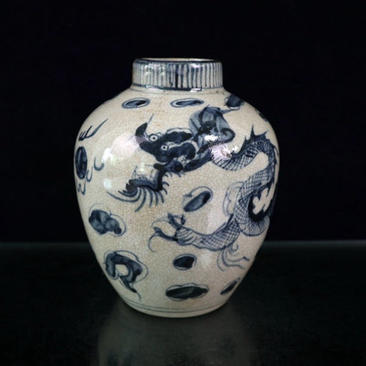Open blue and white dragon patterned jar