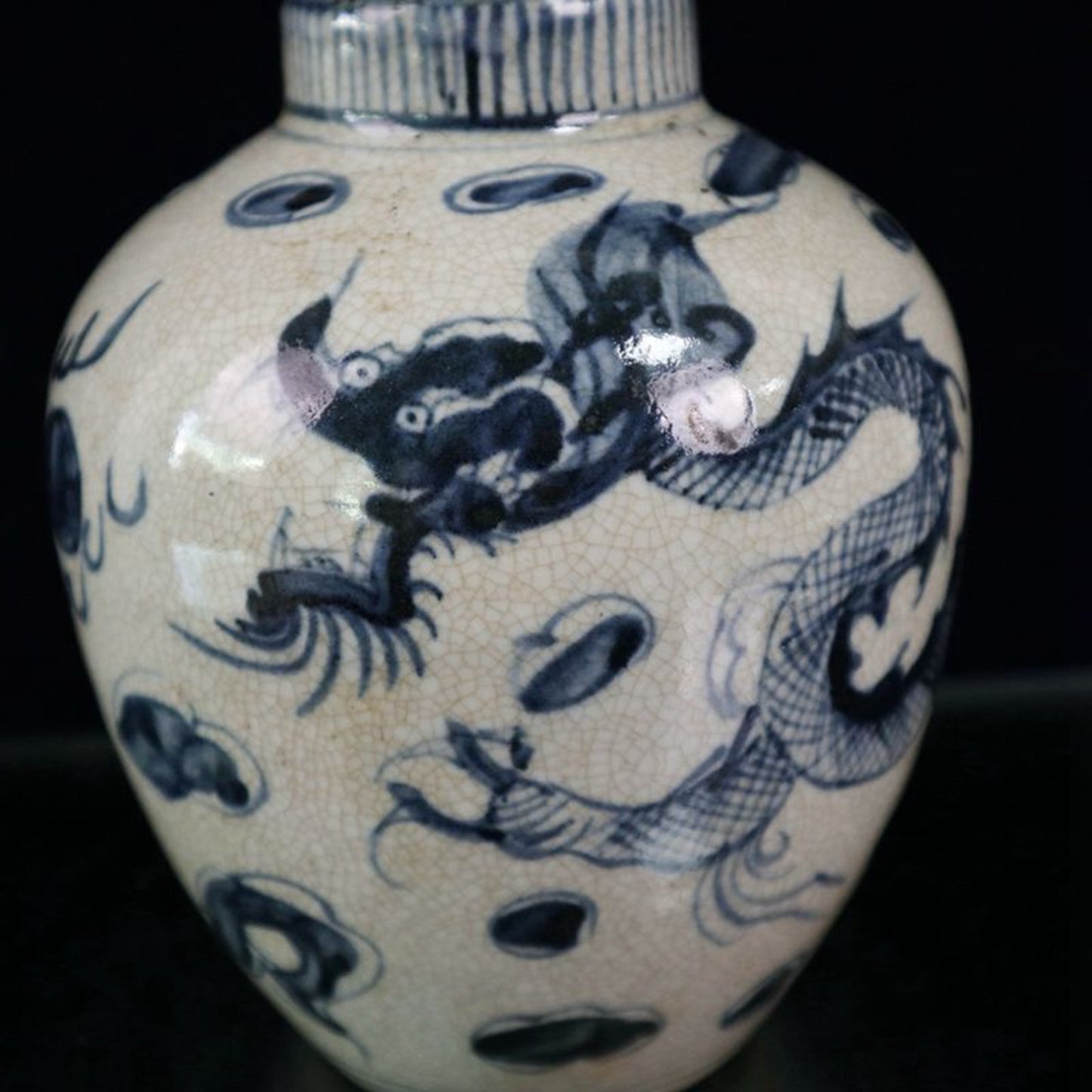Open blue and white dragon patterned jar