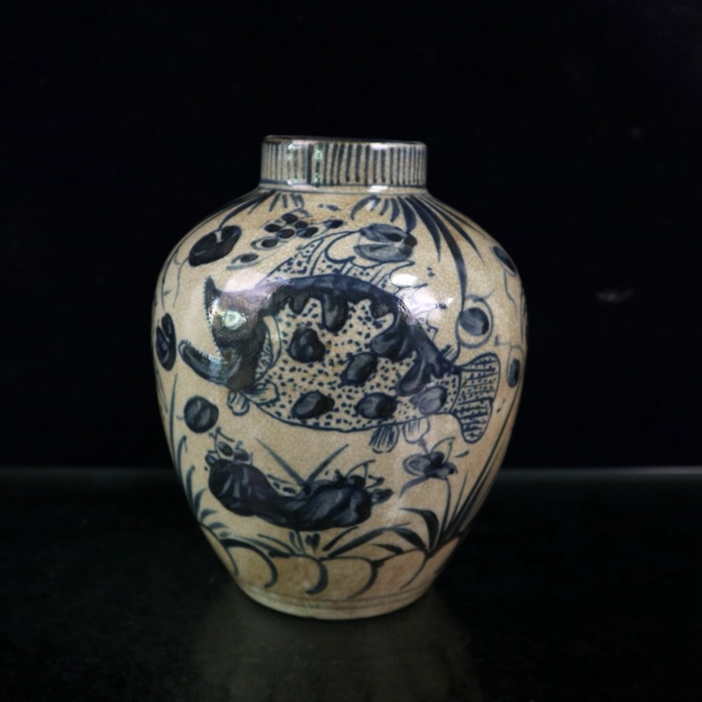 Open blue and white fish pattern jar