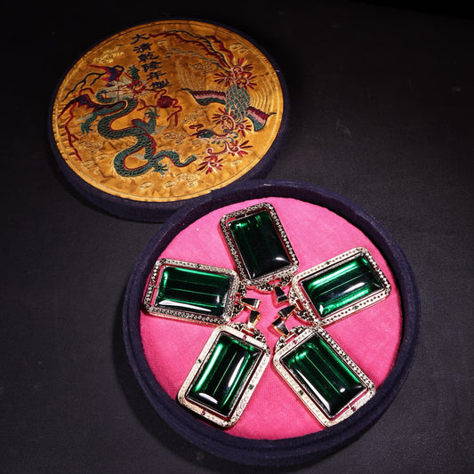 A box of Chinese antique emerald transport rackets