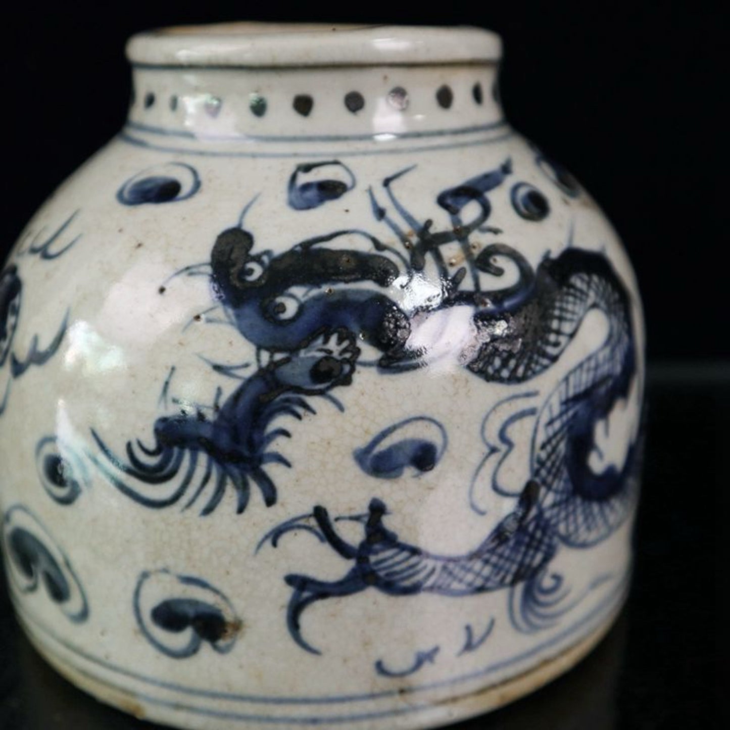 Open blue and white dragon patterned jar