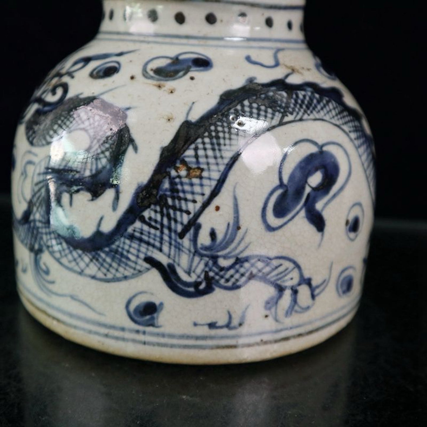 Open blue and white dragon patterned jar