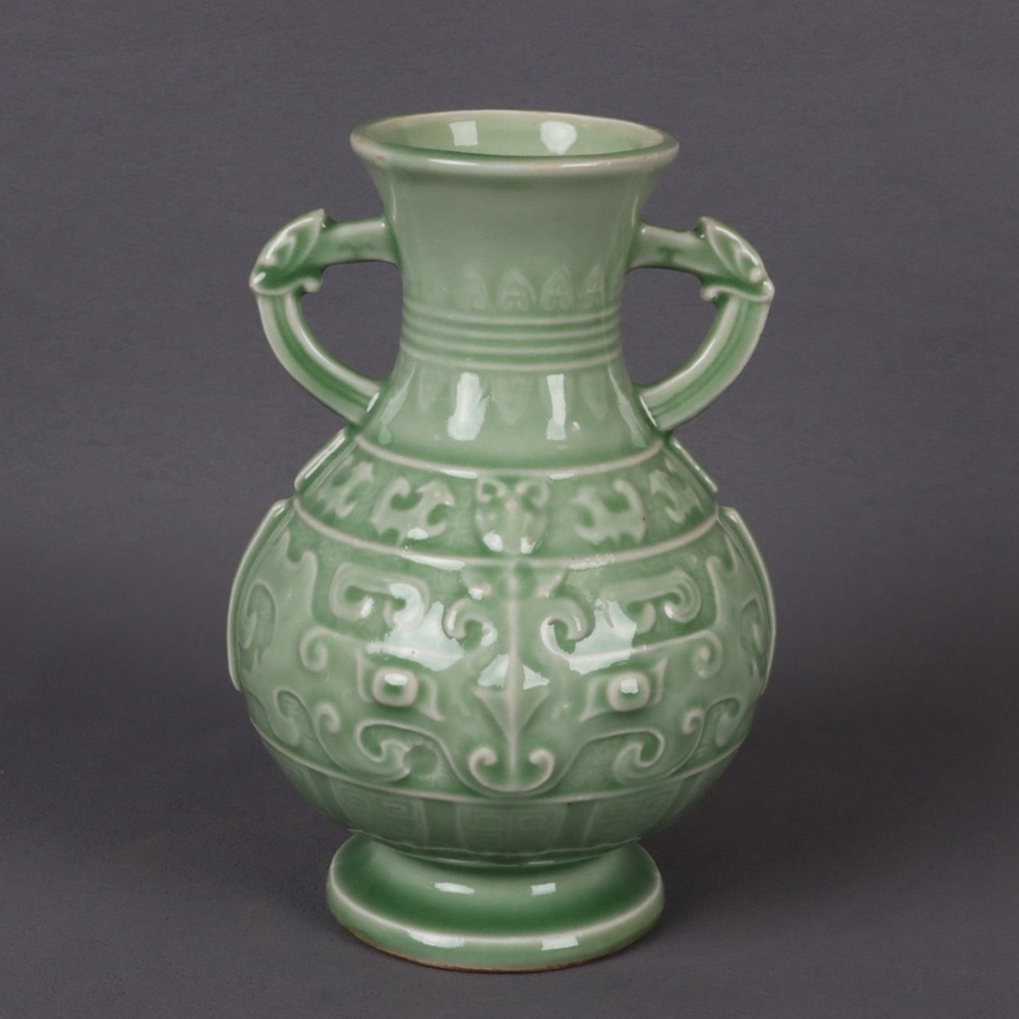 Blue glazed relief auspicious sheep pattern double ear vase