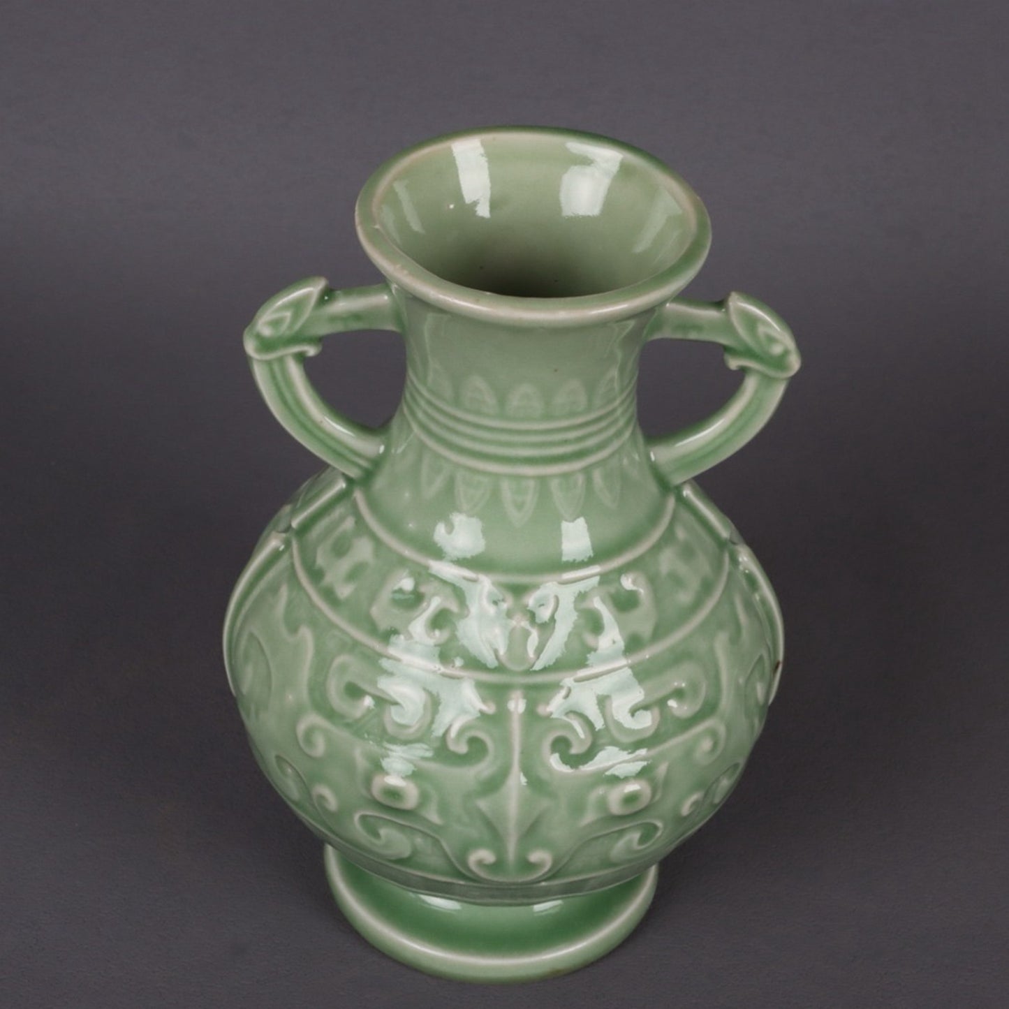 Blue glazed relief auspicious sheep pattern double ear vase