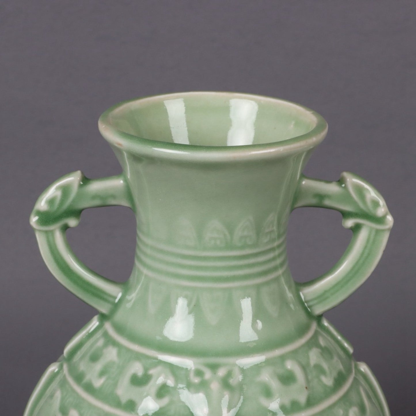 Blue glazed relief auspicious sheep pattern double ear vase