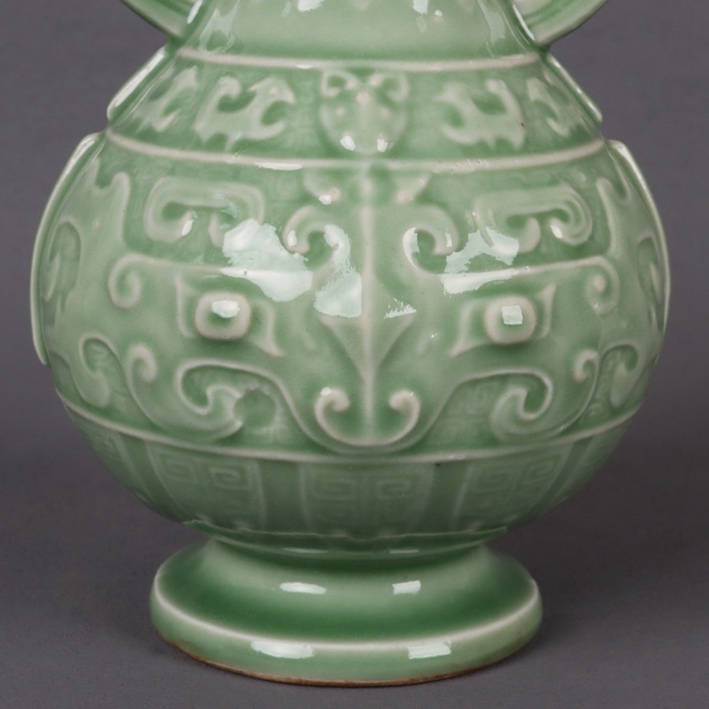 Blue glazed relief auspicious sheep pattern double ear vase