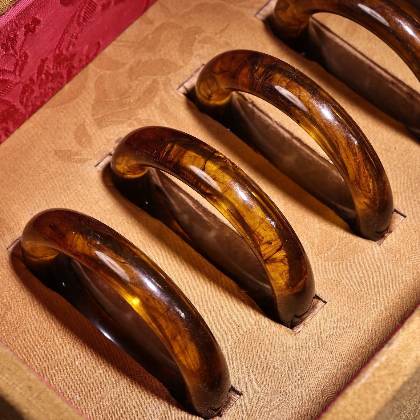 A box of Chinese antique amber bracelets