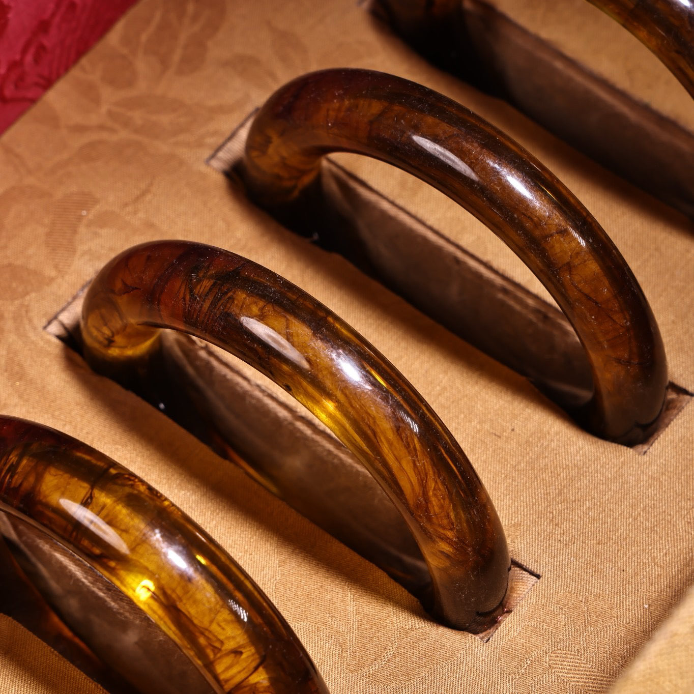 A box of Chinese antique amber bracelets