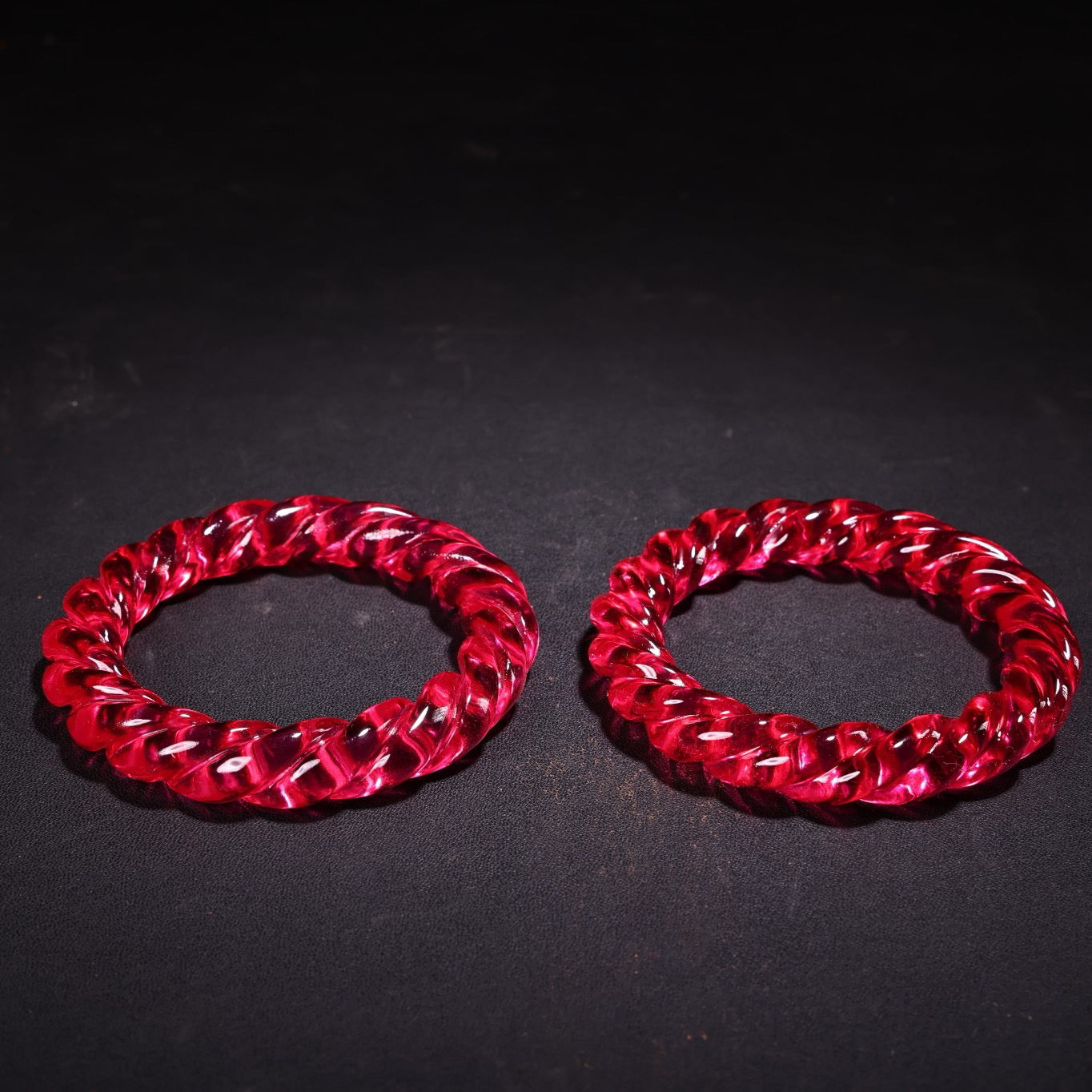 A pair of Chinese antique gemstone carved Fried Dough Twists bracelets