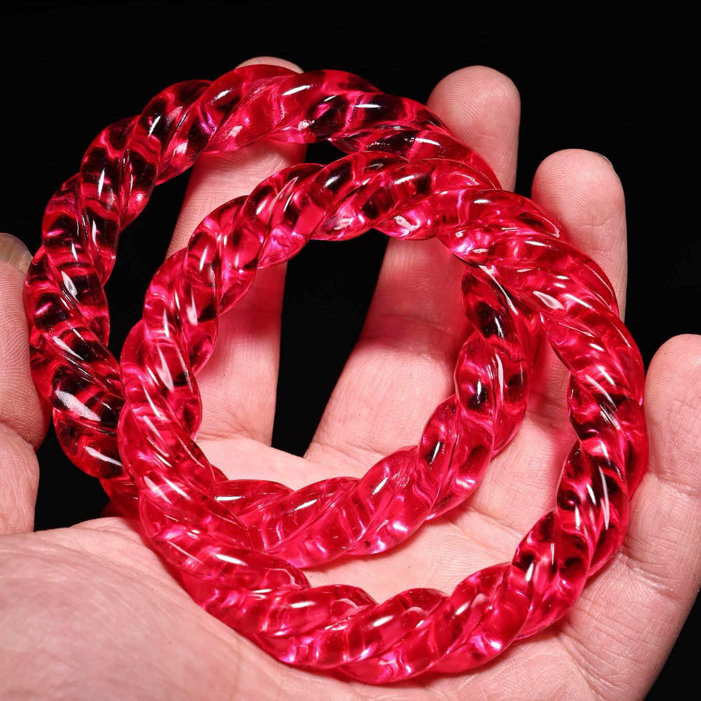 A pair of Chinese antique gemstone carved Fried Dough Twists bracelets