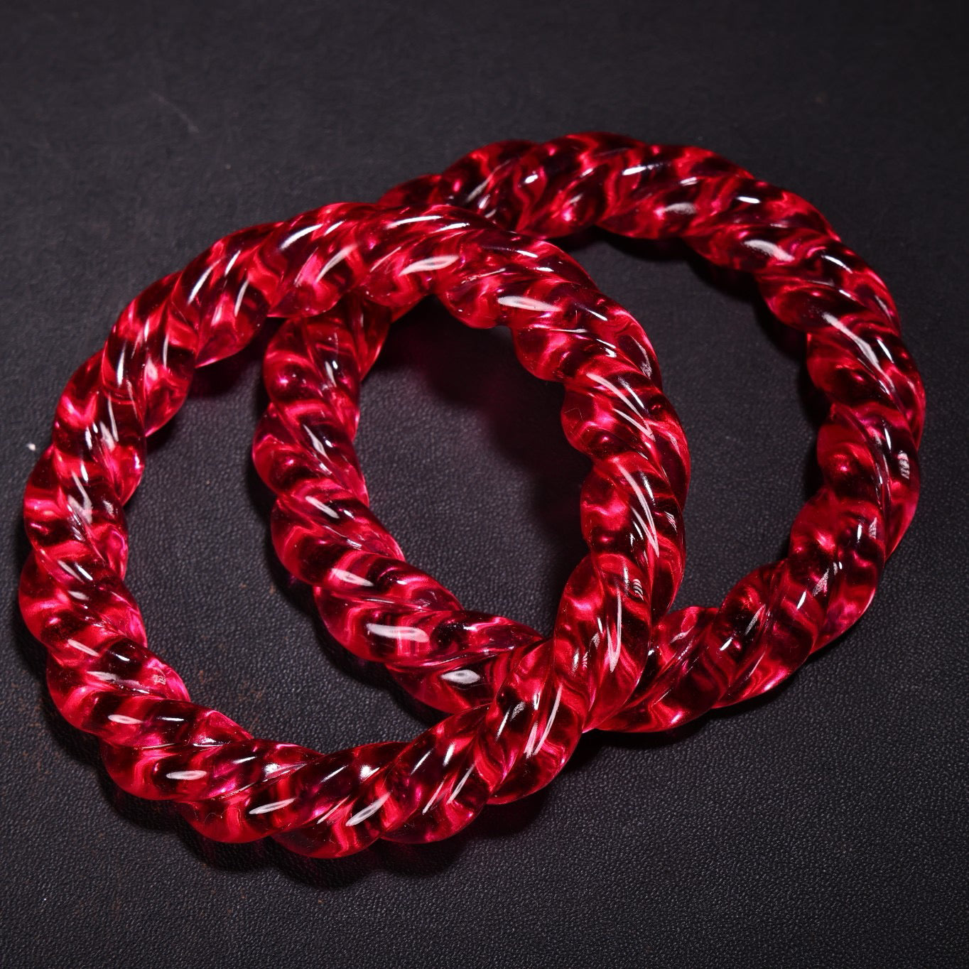 A pair of Chinese antique gemstone carved Fried Dough Twists bracelets