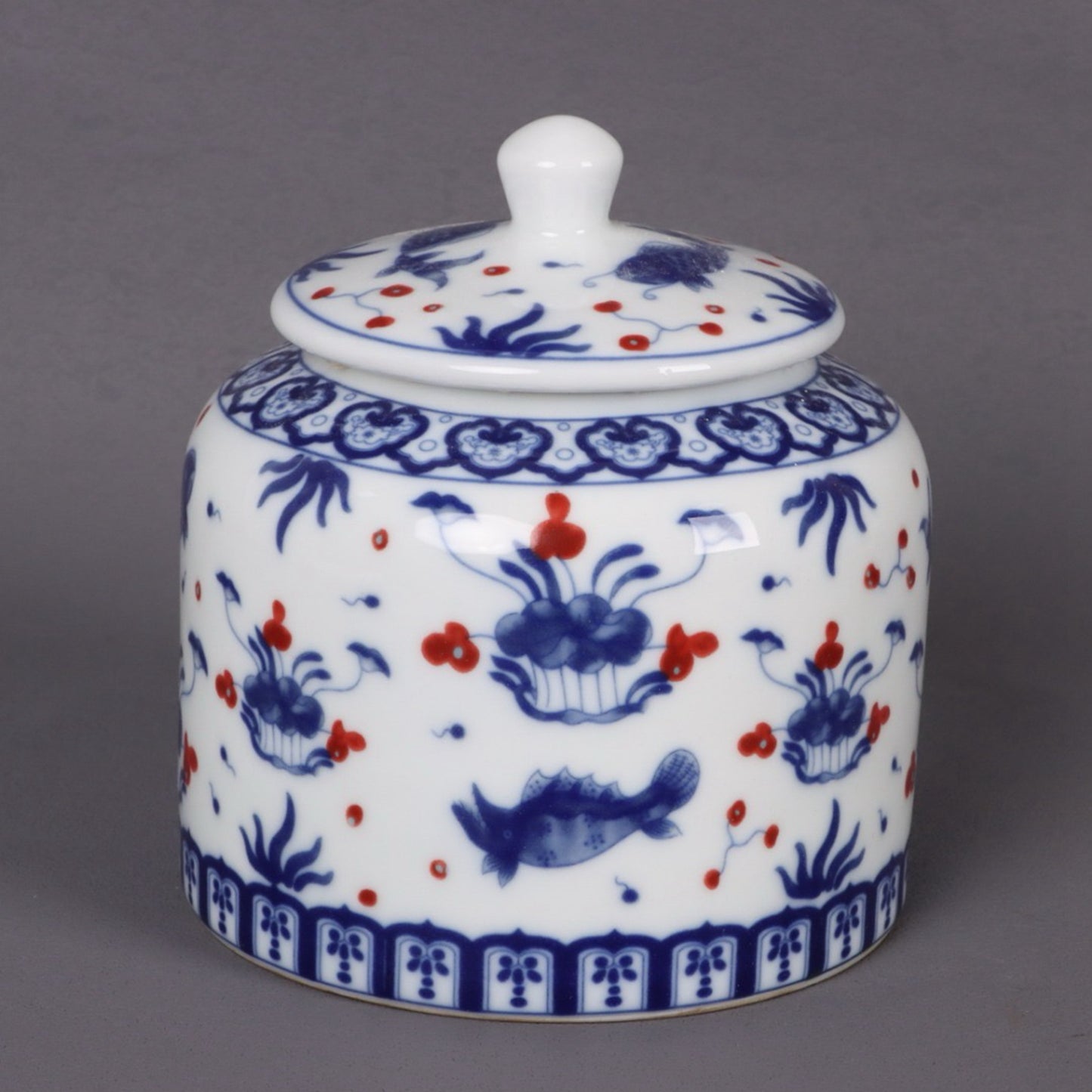 Blue and white glazed red fish algae patterned tea jar