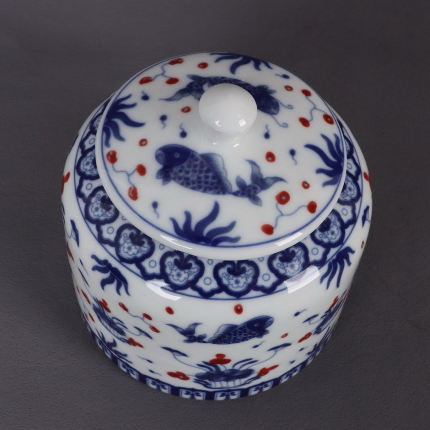 Blue and white glazed red fish algae patterned tea jar