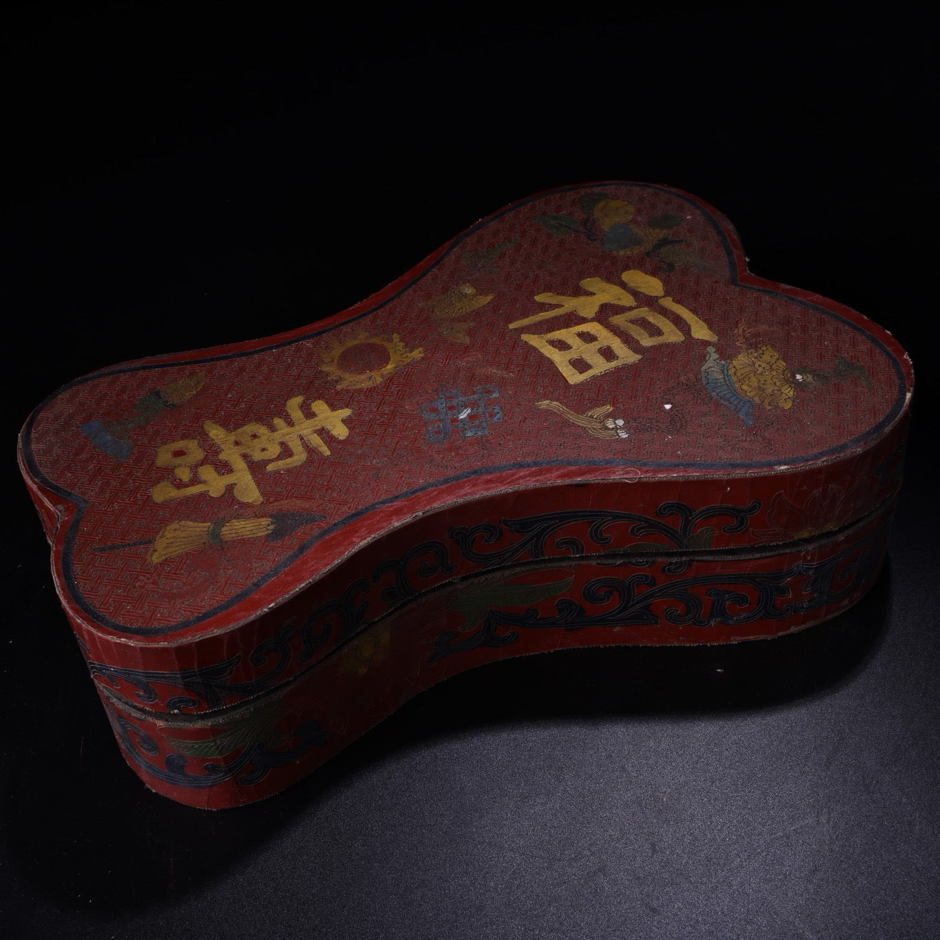 A box of Chinese antique red cat's eye stone rings