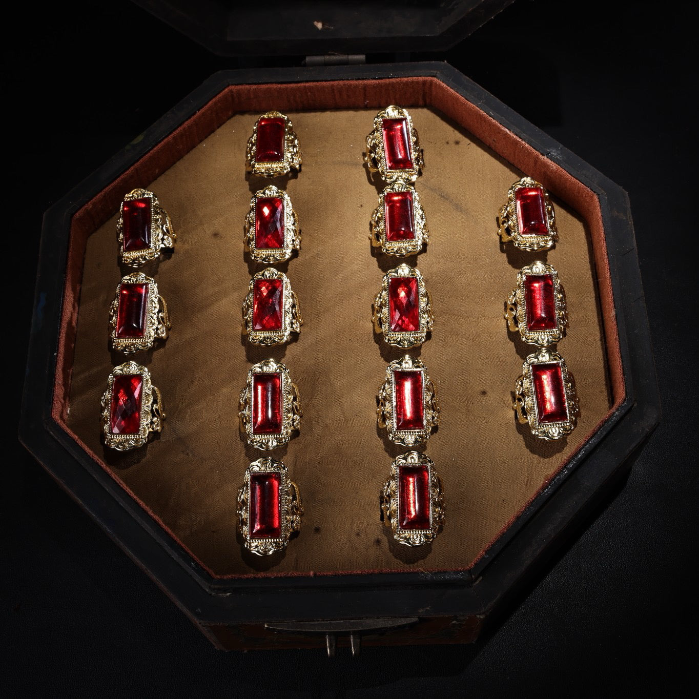 A box of Chinese antique ruby rings