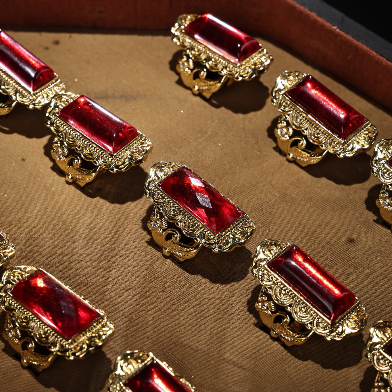 A box of Chinese antique ruby rings