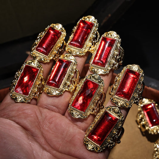 A box of Chinese antique ruby rings