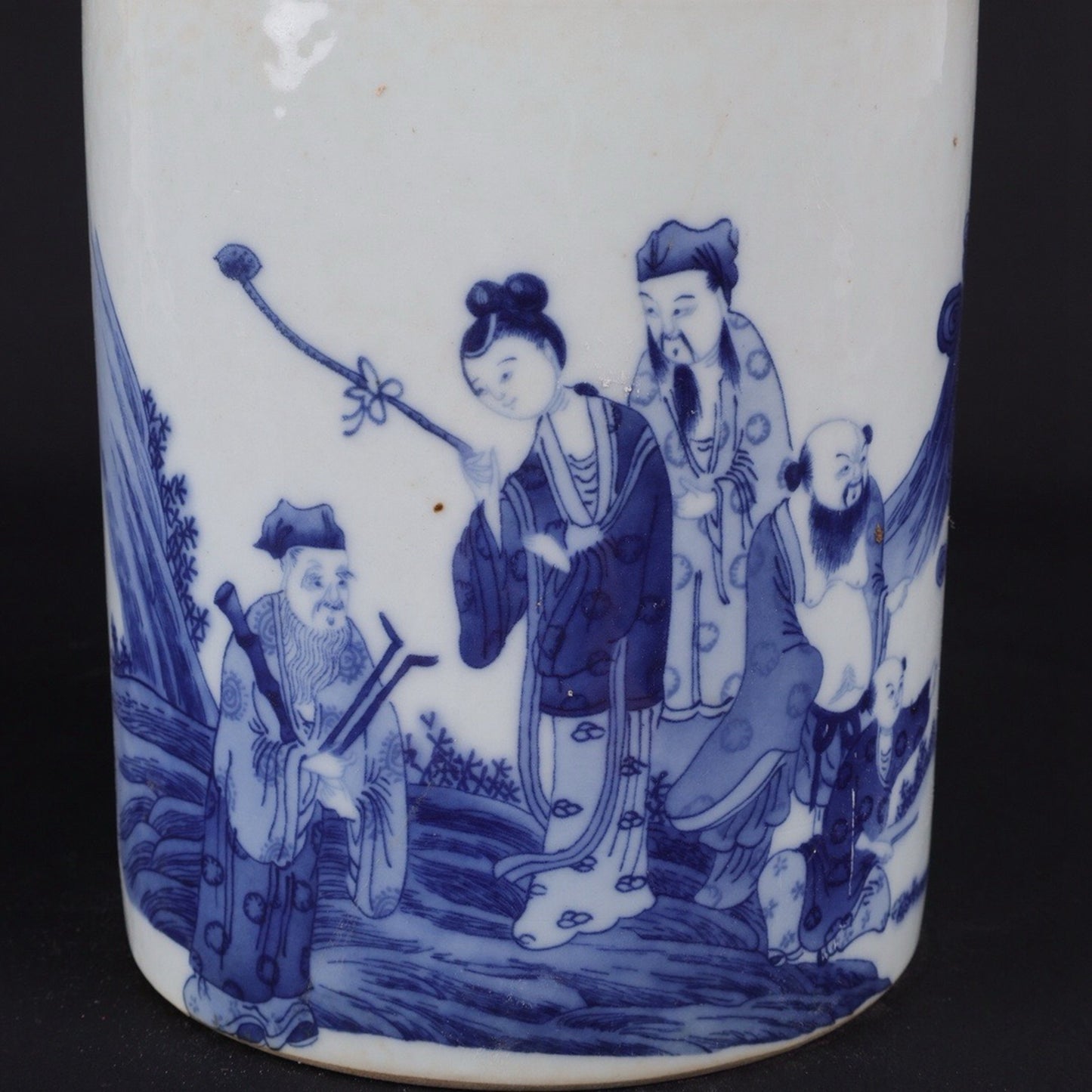 Blue and white Eight Immortals Crossing the Sea pattern pen holder