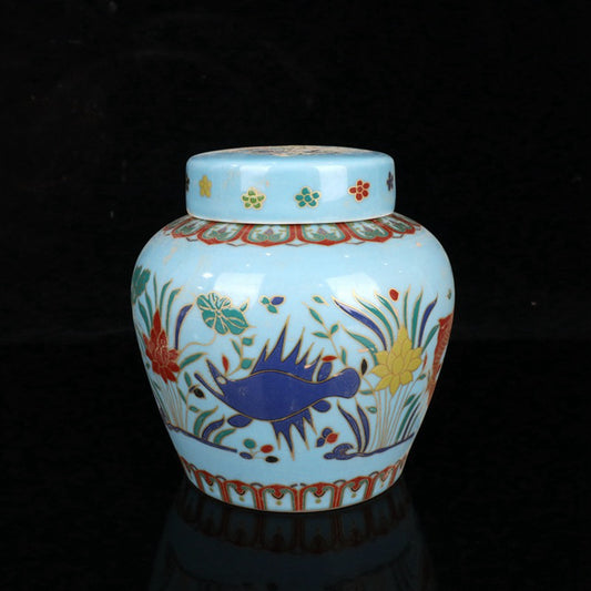Colored fish and algae patterned sky shaped jar
