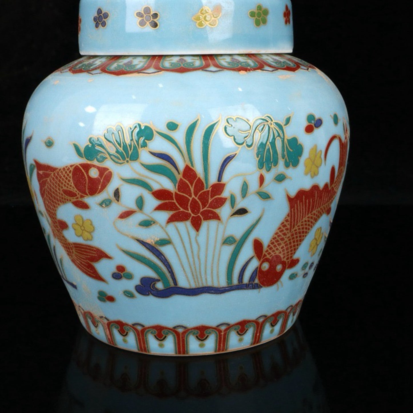 Colored fish and algae patterned sky shaped jar