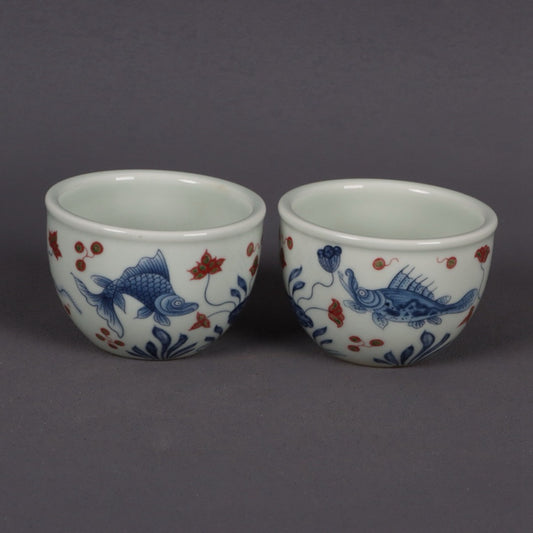 Blue and white glazed red fish and algae patterned small mouth cup