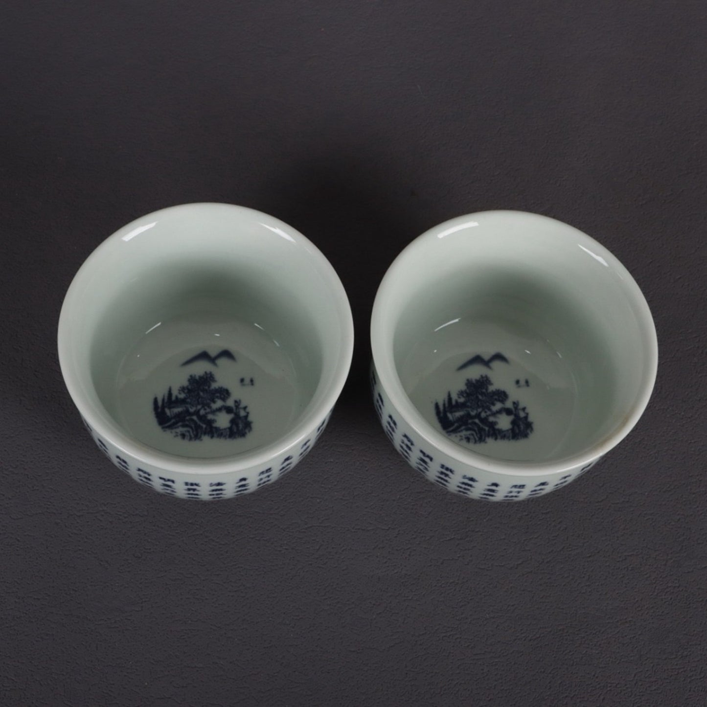 A pair of blue and white Polomi Heart Sutra patterned mouth cups