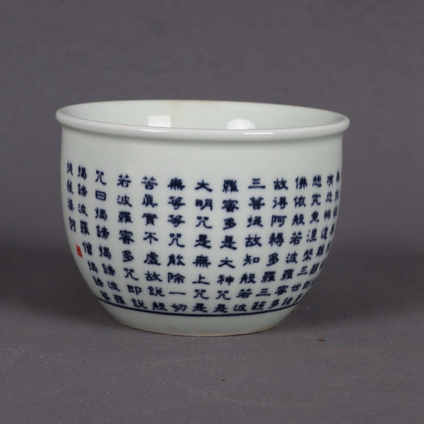 A pair of blue and white Polomi Heart Sutra patterned mouth cups