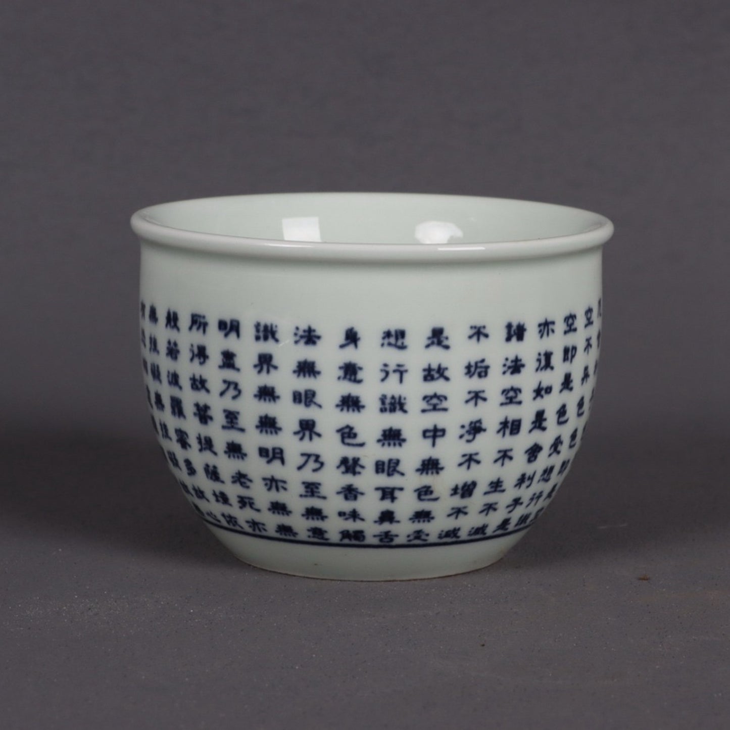 A pair of blue and white Polomi Heart Sutra patterned mouth cups