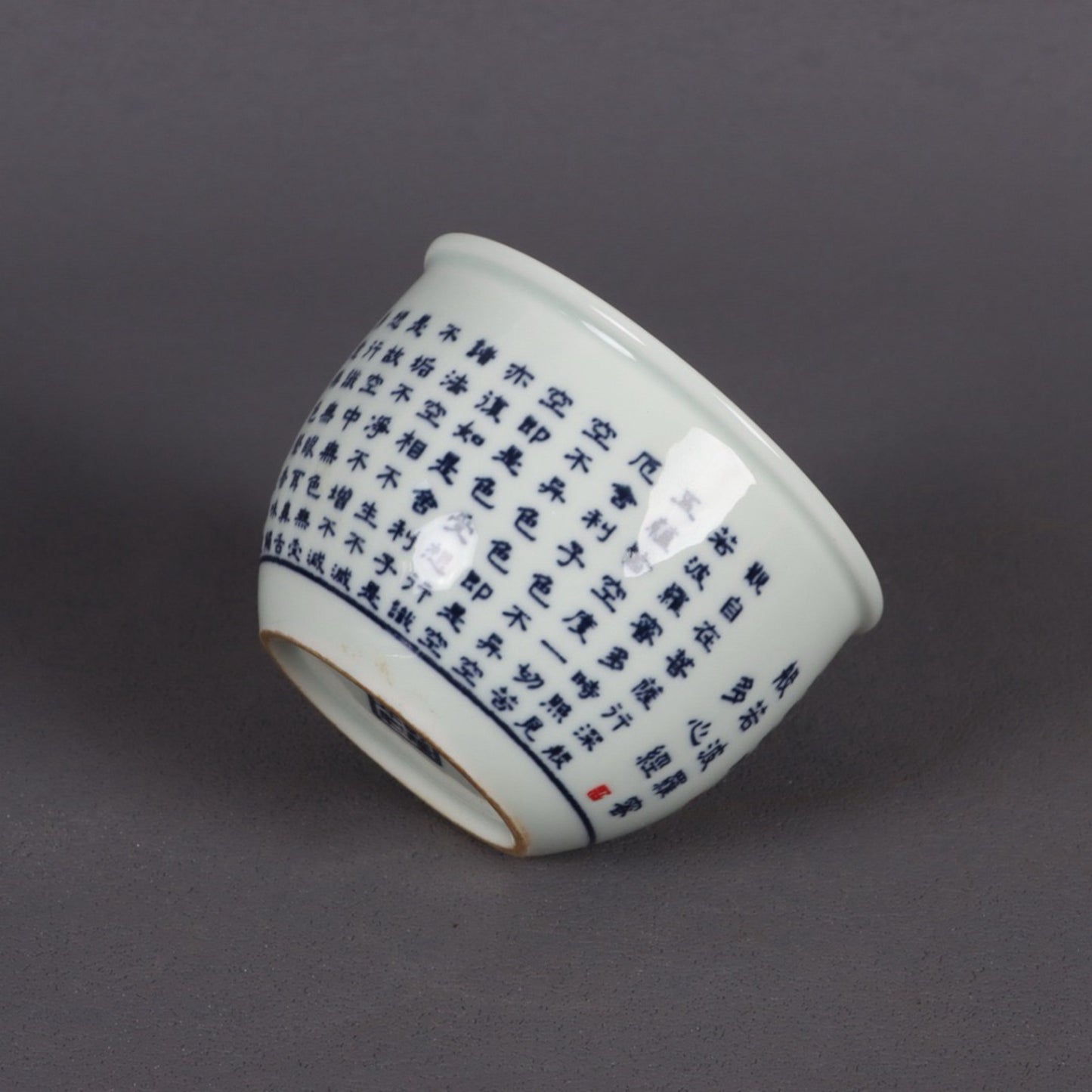 A pair of blue and white Polomi Heart Sutra patterned mouth cups