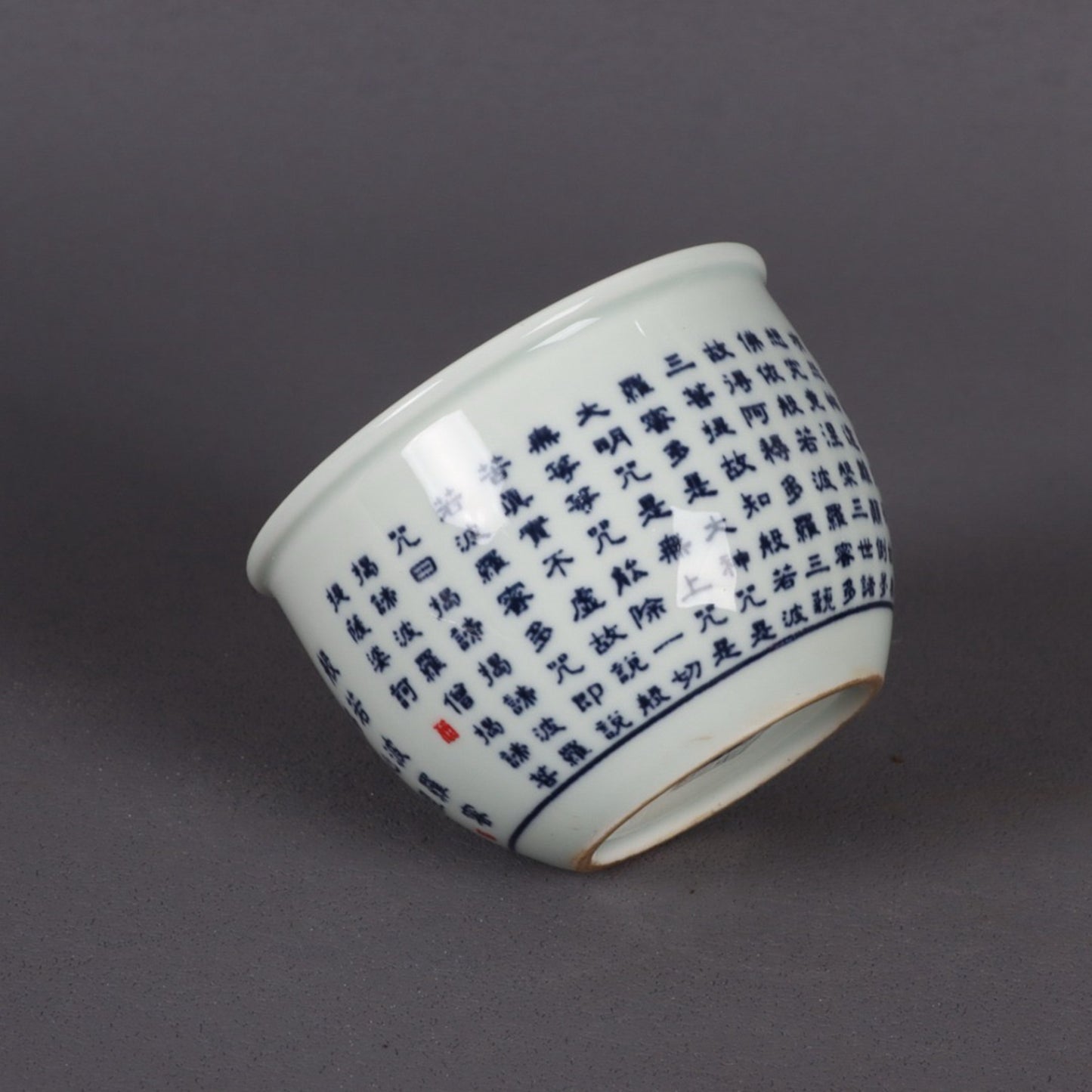 A pair of blue and white Polomi Heart Sutra patterned mouth cups