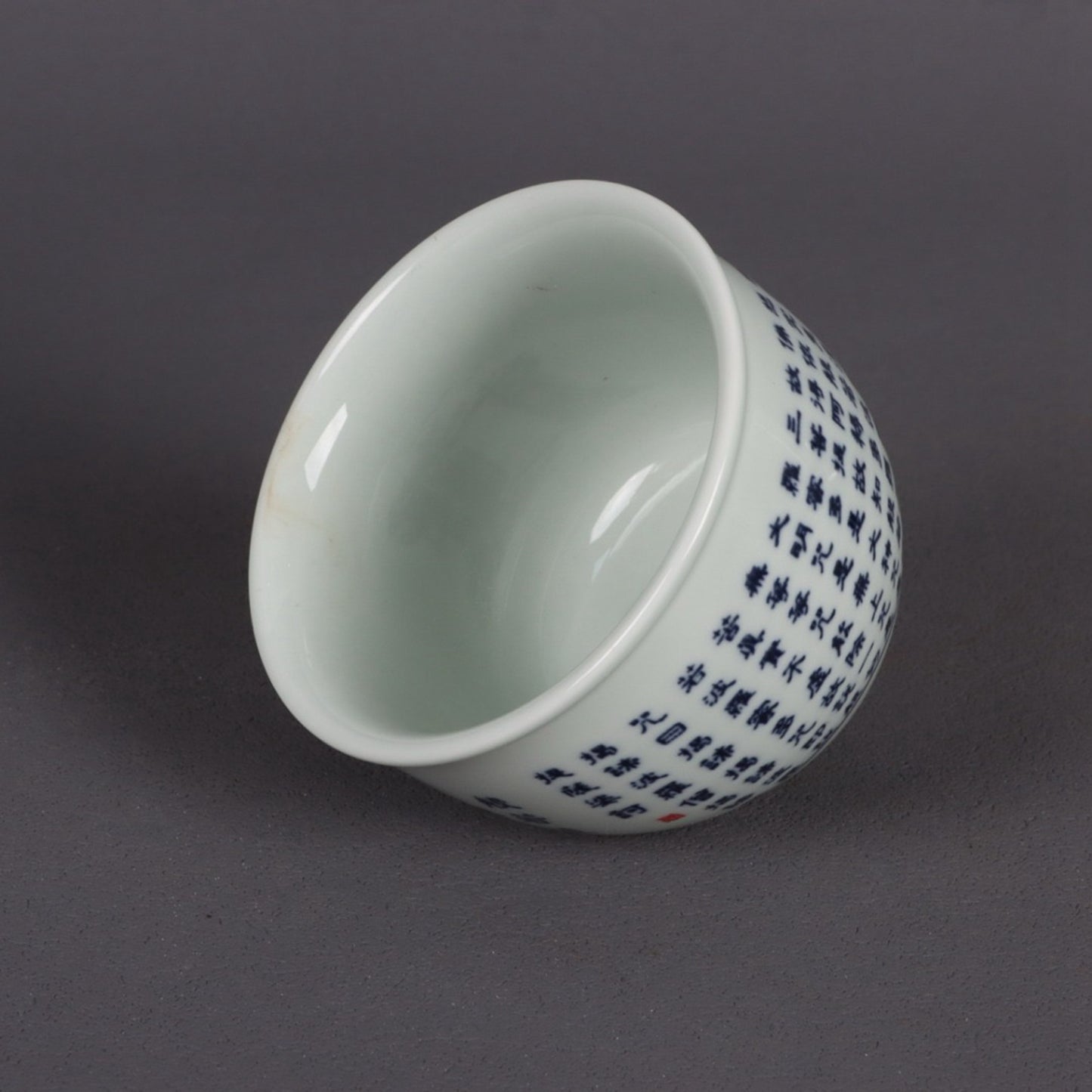 A pair of blue and white Polomi Heart Sutra patterned mouth cups