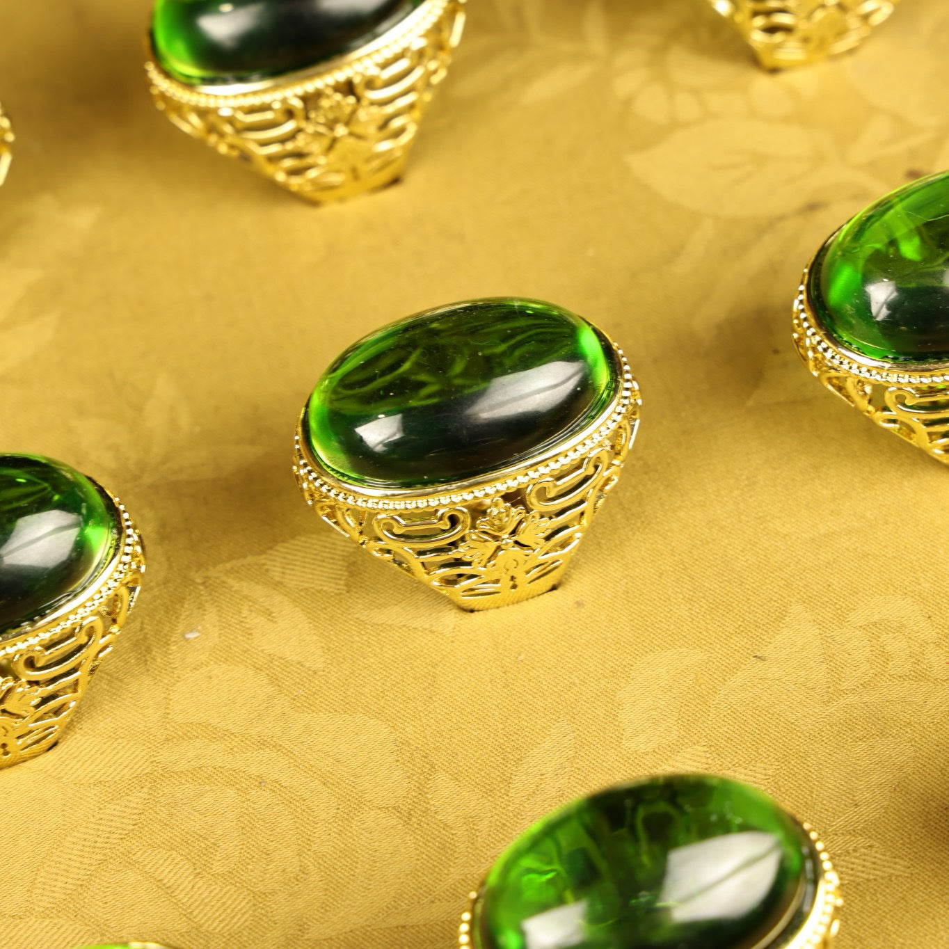 A box of Chinese antique grandmother emerald rings