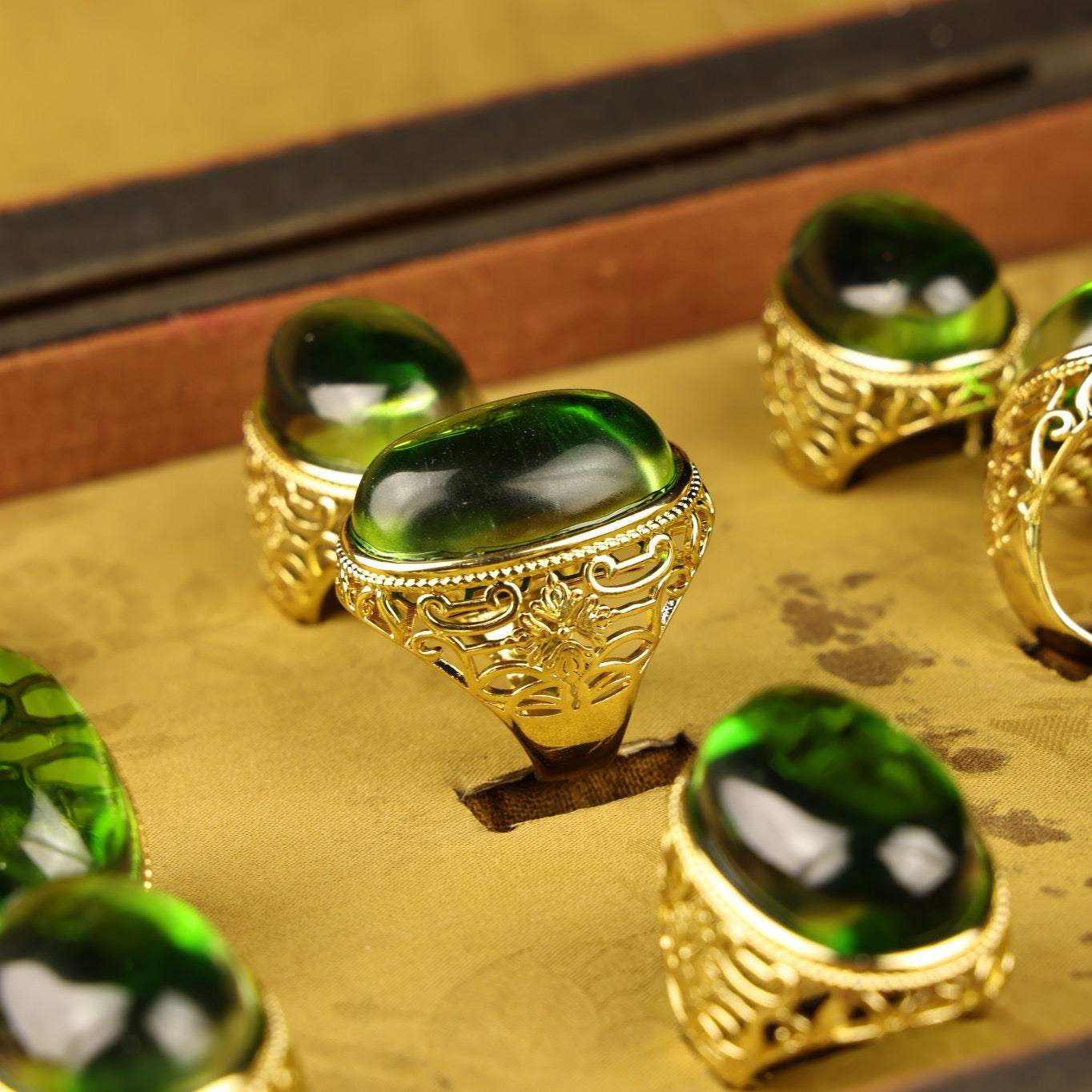 A box of Chinese antique grandmother emerald rings