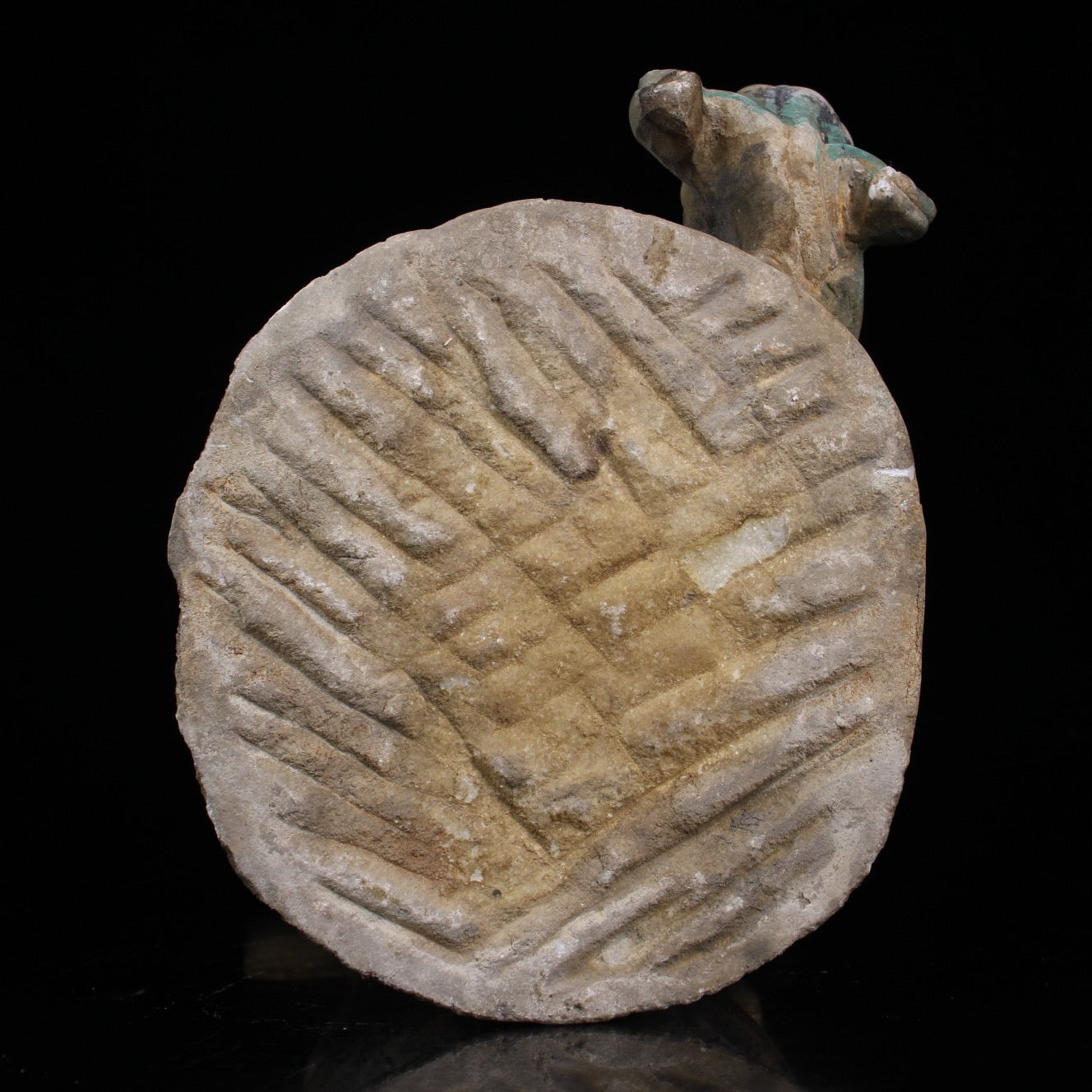 A sitting Buddha statue carved and painted on Chinese antique jade during the Northern Qi Dynasty