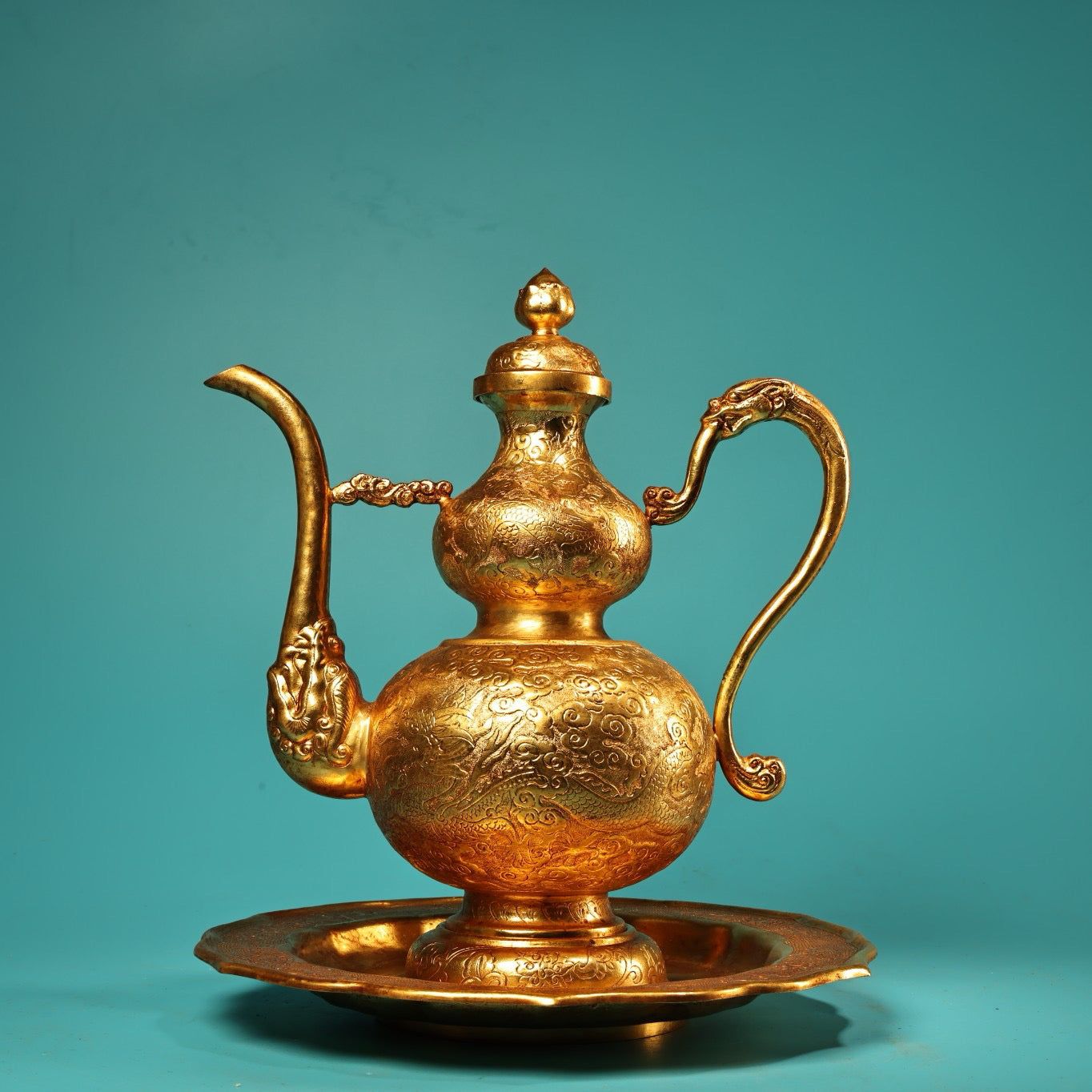 A set of Chinese antique pure copper high relief carved gourd wine pot with plates and wine utensils